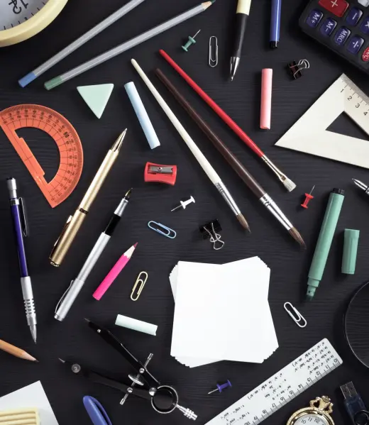 school-supplies-on-black-wood-2024-10-12-18-11-05-utc